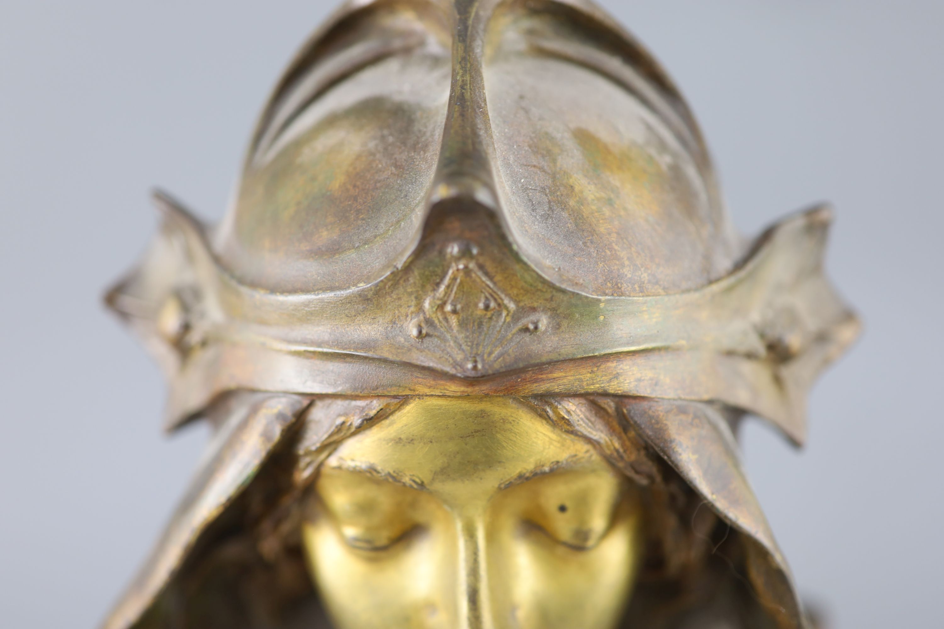 Henry Jacobs. An Art Nouveau gilt bronze bust of a medieval maiden, height 14in., on associated marble plinth